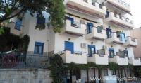 Egeon Rooms, частни квартири в града Neos Marmaras, Гърция